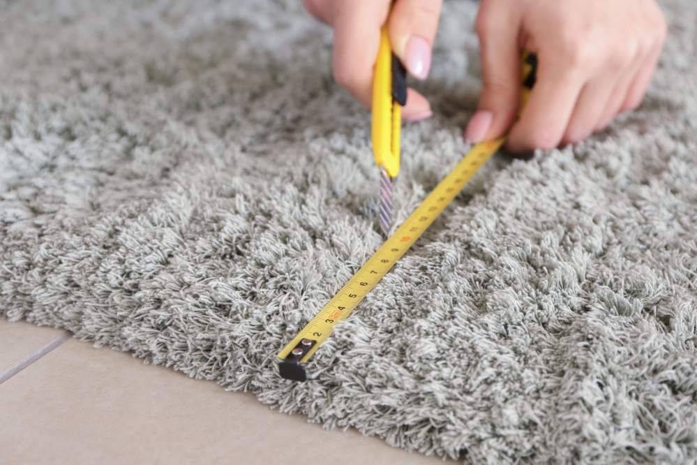 Carpet being measured